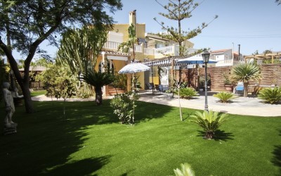 A fully renovated corner bungalow with a large garden.